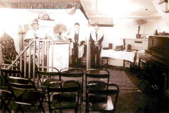 Congregation Beth Israel services held in Dr. and Mrs. Nate Oremland’s basement.