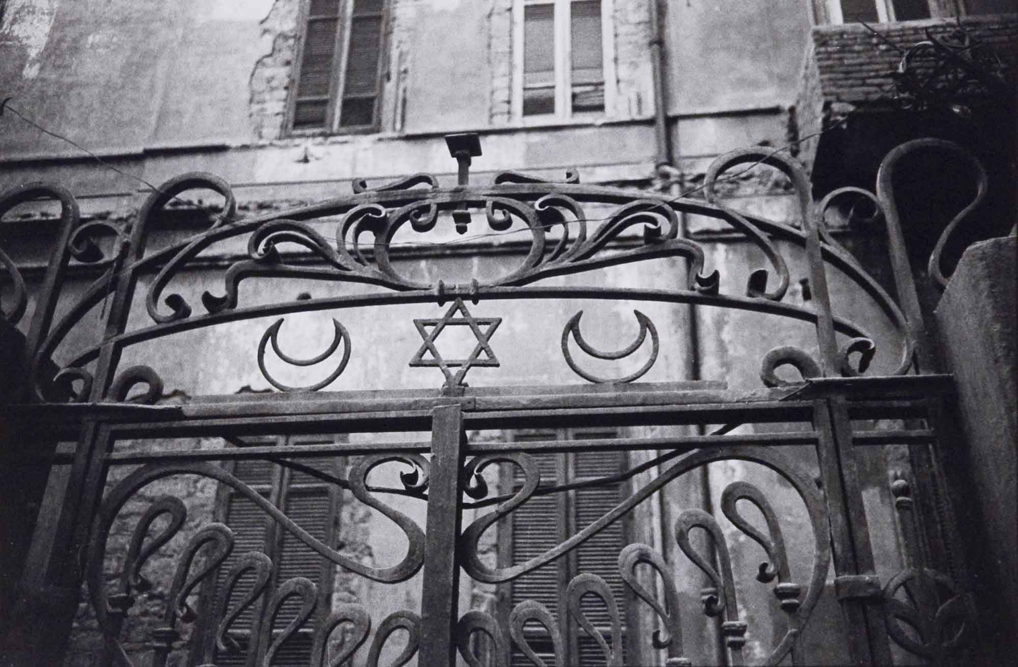 iron gate with moon and star of David
